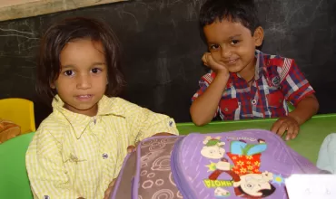 kids_sitting_on_new_chairs_and_table